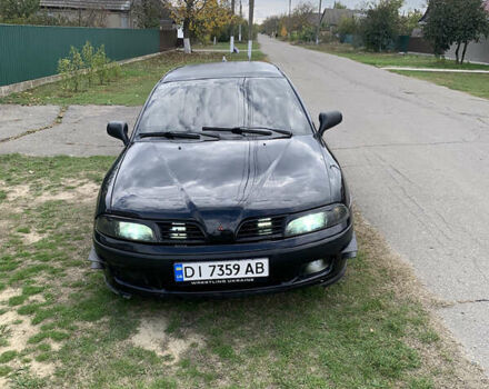 Міцубісі Харизма 2002 у Измаиле на Automoto.ua Чорний Міцубісі Харизма, об'ємом двигуна 1.6 л та пробігом 500 тис. км за 2600 $, фото 15 на Automoto.ua
