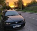 Чорний Міцубісі Харизма, об'ємом двигуна 1.6 л та пробігом 408 тис. км за 2600 $, фото 1 на Automoto.ua