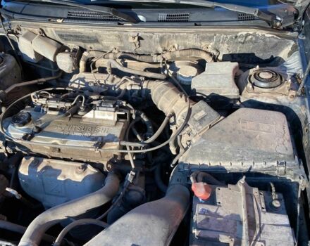 Черный Мицубиси Харизма, объемом двигателя 1.6 л и пробегом 30 тыс. км за 3000 $, фото 5 на Automoto.ua