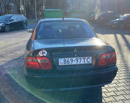 Черный Мицубиси Харизма, объемом двигателя 1.6 л и пробегом 30 тыс. км за 3000 $, фото 1 на Automoto.ua
