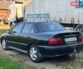 Черный Мицубиси Харизма, объемом двигателя 1.6 л и пробегом 300 тыс. км за 2300 $, фото 5 на Automoto.ua