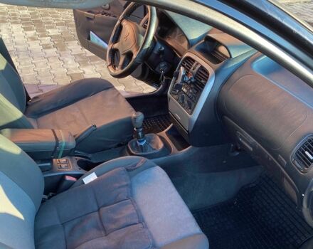 Черный Мицубиси Харизма, объемом двигателя 1.6 л и пробегом 30 тыс. км за 3000 $, фото 7 на Automoto.ua