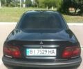 Чорний Міцубісі Харизма, об'ємом двигуна 1.6 л та пробігом 281 тис. км за 4200 $, фото 7 на Automoto.ua