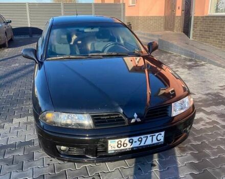 Черный Мицубиси Харизма, объемом двигателя 1.6 л и пробегом 30 тыс. км за 3000 $, фото 9 на Automoto.ua