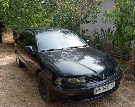 Черный Мицубиси Харизма, объемом двигателя 1.6 л и пробегом 167 тыс. км за 3100 $, фото 2 на Automoto.ua