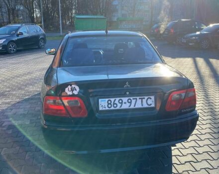 Черный Мицубиси Харизма, объемом двигателя 1.6 л и пробегом 30 тыс. км за 3000 $, фото 2 на Automoto.ua