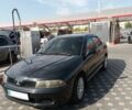 Черный Мицубиси Харизма, объемом двигателя 1.6 л и пробегом 260 тыс. км за 4000 $, фото 1 на Automoto.ua