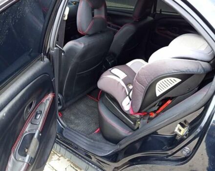 Черный Мицубиси Харизма, объемом двигателя 1.6 л и пробегом 140 тыс. км за 3500 $, фото 4 на Automoto.ua