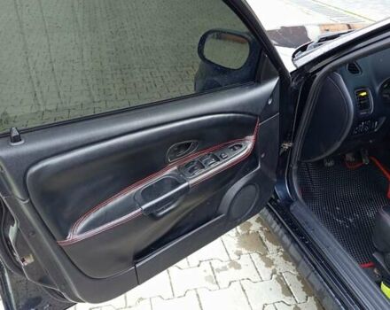 Черный Мицубиси Харизма, объемом двигателя 1.6 л и пробегом 140 тыс. км за 3500 $, фото 6 на Automoto.ua