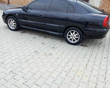 Черный Мицубиси Харизма, объемом двигателя 1.6 л и пробегом 140 тыс. км за 3500 $, фото 9 на Automoto.ua