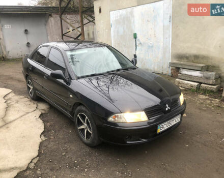 Чорний Міцубісі Харизма, об'ємом двигуна 1.6 л та пробігом 270 тис. км за 4300 $, фото 1 на Automoto.ua