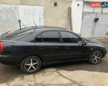 Чорний Міцубісі Харизма, об'ємом двигуна 1.6 л та пробігом 270 тис. км за 4300 $, фото 2 на Automoto.ua