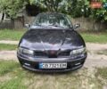 Черный Мицубиси Харизма, объемом двигателя 1.6 л и пробегом 258 тыс. км за 3500 $, фото 1 на Automoto.ua