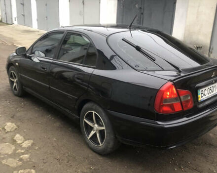 Чорний Міцубісі Харизма, об'ємом двигуна 1.6 л та пробігом 270 тис. км за 4300 $, фото 5 на Automoto.ua