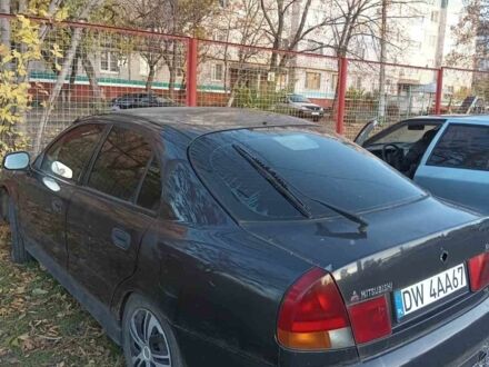 Чорний Міцубісі Харизма, об'ємом двигуна 0 л та пробігом 100 тис. км за 716 $, фото 1 на Automoto.ua