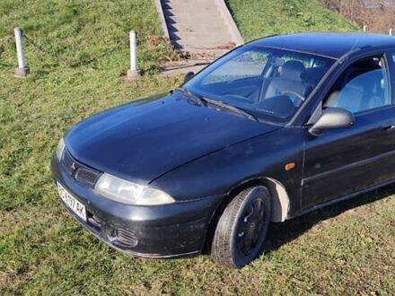 Міцубісі Харизма 1998 у Буске на Automoto.ua Чорний Міцубісі Харизма, об'ємом двигуна 1.6 л та пробігом 330 тис. км за 1700 $, фото 1 на Automoto.ua