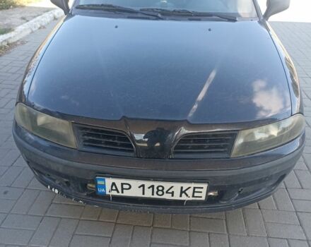 Чорний Міцубісі Харизма, об'ємом двигуна 1.6 л та пробігом 402 тис. км за 2200 $, фото 1 на Automoto.ua