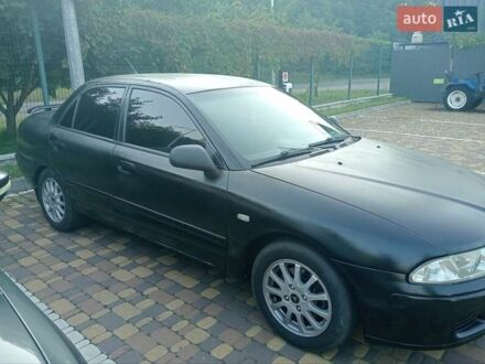 Мицубиси Харизма 2003 в Буче на Automoto.ua Черный Мицубиси Харизма, объемом двигателя 1.6 л и пробегом 390 тыс. км за 2700 $, фото 1 на Automoto.ua