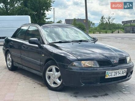 Міцубісі Харизма 2003 у Надворной на Automoto.ua Чорний Міцубісі Харизма, об'ємом двигуна 1.6 л та пробігом 300 тис. км за 2250 $, фото 1 на Automoto.ua