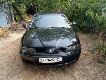 Чорний Міцубісі Харизма, об'ємом двигуна 1.6 л та пробігом 167 тис. км за 3100 $, фото 1 на Automoto.ua