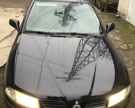 Чорний Міцубісі Харизма, об'ємом двигуна 1.6 л та пробігом 270 тис. км за 4300 $, фото 1 на Automoto.ua