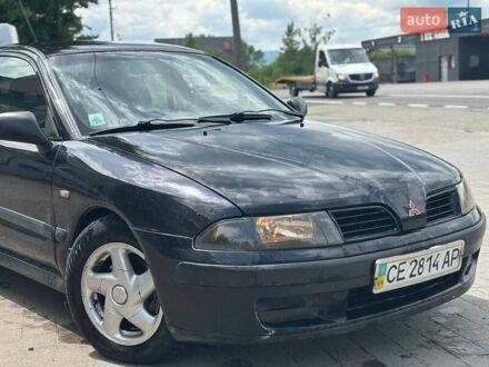 Міцубісі Харизма 2003 у Надворной на Automoto.ua Чорний Міцубісі Харизма, об'ємом двигуна 1.6 л та пробігом 300 тис. км за 2099 $, фото 1 на Automoto.ua