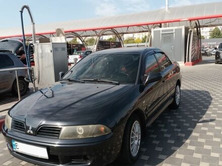 Мицубиси Харизма 2004 в Полтаве на Automoto.ua Черный Мицубиси Харизма, объемом двигателя 1.6 л и пробегом 260 тыс. км за 4000 $, фото 1 на Automoto.ua