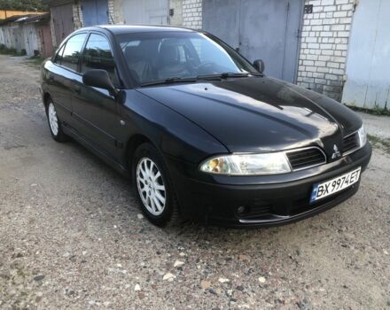 Чорний Міцубісі Харизма, об'ємом двигуна 1.9 л та пробігом 300 тис. км за 2500 $, фото 1 на Automoto.ua