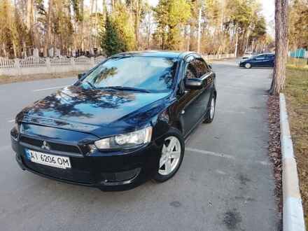 Черный Мицубиси Харизма, объемом двигателя 1.5 л и пробегом 230 тыс. км за 5300 $, фото 1 на Automoto.ua