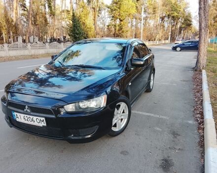 Чорний Міцубісі Харизма, об'ємом двигуна 1.5 л та пробігом 230 тис. км за 5300 $, фото 1 на Automoto.ua