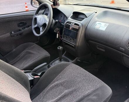 Фіолетовий Міцубісі Харизма, об'ємом двигуна 1.6 л та пробігом 236 тис. км за 3000 $, фото 4 на Automoto.ua