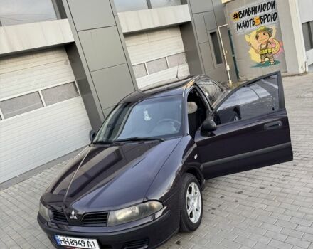 Фіолетовий Міцубісі Харизма, об'ємом двигуна 1.6 л та пробігом 236 тис. км за 3000 $, фото 6 на Automoto.ua