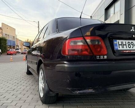 Фиолетовый Мицубиси Харизма, объемом двигателя 1.6 л и пробегом 236 тыс. км за 3000 $, фото 2 на Automoto.ua