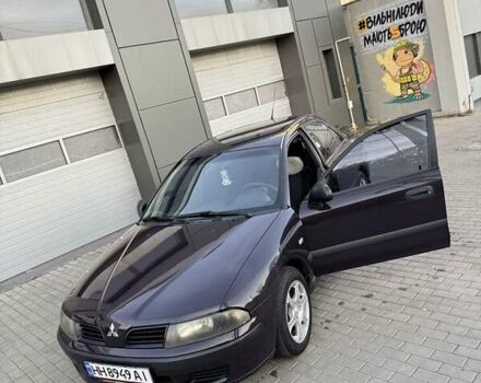 Фиолетовый Мицубиси Харизма, объемом двигателя 1.6 л и пробегом 236 тыс. км за 3000 $, фото 5 на Automoto.ua