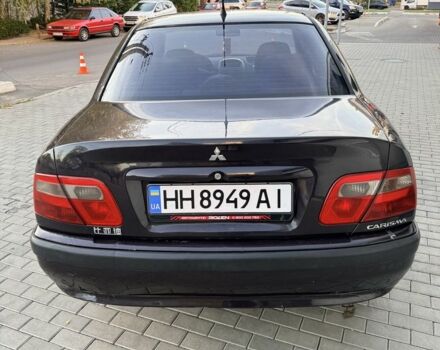 Фіолетовий Міцубісі Харизма, об'ємом двигуна 1.6 л та пробігом 236 тис. км за 3000 $, фото 2 на Automoto.ua