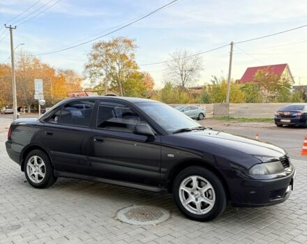 Фіолетовий Міцубісі Харизма, об'ємом двигуна 1.6 л та пробігом 236 тис. км за 3000 $, фото 1 на Automoto.ua