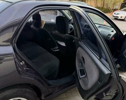 Фиолетовый Мицубиси Харизма, объемом двигателя 1.6 л и пробегом 236 тыс. км за 3000 $, фото 6 на Automoto.ua