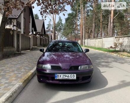 Фиолетовый Мицубиси Харизма, объемом двигателя 1.6 л и пробегом 400 тыс. км за 3600 $, фото 1 на Automoto.ua