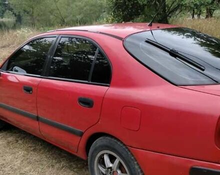 Красный Мицубиси Харизма, объемом двигателя 1.6 л и пробегом 367 тыс. км за 3200 $, фото 9 на Automoto.ua