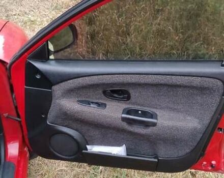 Красный Мицубиси Харизма, объемом двигателя 1.6 л и пробегом 367 тыс. км за 3200 $, фото 11 на Automoto.ua