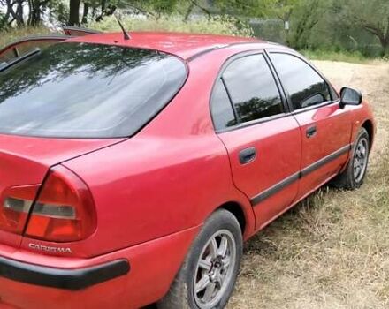 Красный Мицубиси Харизма, объемом двигателя 1.6 л и пробегом 367 тыс. км за 3200 $, фото 10 на Automoto.ua