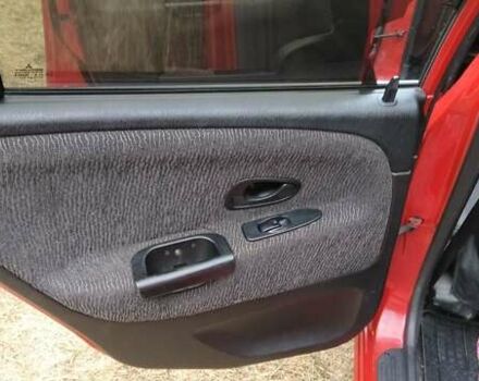 Красный Мицубиси Харизма, объемом двигателя 1.6 л и пробегом 367 тыс. км за 3200 $, фото 14 на Automoto.ua