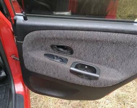 Красный Мицубиси Харизма, объемом двигателя 1.6 л и пробегом 367 тыс. км за 3200 $, фото 12 на Automoto.ua