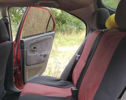 Красный Мицубиси Харизма, объемом двигателя 1.6 л и пробегом 367 тыс. км за 3200 $, фото 6 на Automoto.ua