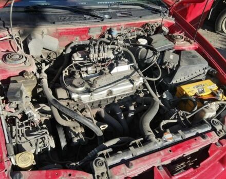 Красный Мицубиси Харизма, объемом двигателя 1.8 л и пробегом 327 тыс. км за 2700 $, фото 7 на Automoto.ua