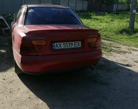 Красный Мицубиси Харизма, объемом двигателя 1.8 л и пробегом 327 тыс. км за 2700 $, фото 6 на Automoto.ua
