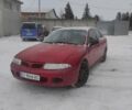 Червоний Міцубісі Харизма, об'ємом двигуна 1.83 л та пробігом 380 тис. км за 1099 $, фото 1 на Automoto.ua