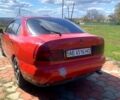 Червоний Міцубісі Харизма, об'ємом двигуна 1.7 л та пробігом 300 тис. км за 2000 $, фото 1 на Automoto.ua