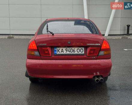 Красный Мицубиси Харизма, объемом двигателя 1.84 л и пробегом 140 тыс. км за 3400 $, фото 3 на Automoto.ua