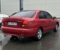 Красный Мицубиси Харизма, объемом двигателя 1.8 л и пробегом 140 тыс. км за 3400 $, фото 3 на Automoto.ua